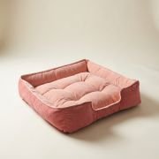 lounger dog bed showing tufted base and dual color combination
