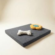 chew toys on orthopedic dog bed