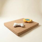 chew toys on orthopedic dog bed