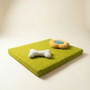 chew toys on orthopedic dog bed