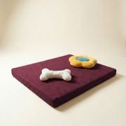 chew toys on orthopedic dog bed