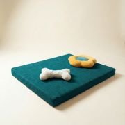 chew toys on orthopedic dog bed