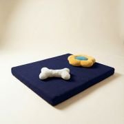 chew toys on orthopedic dog bed