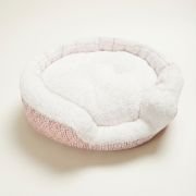 block print dog bed available in multiple sizes with pink canvas exterior