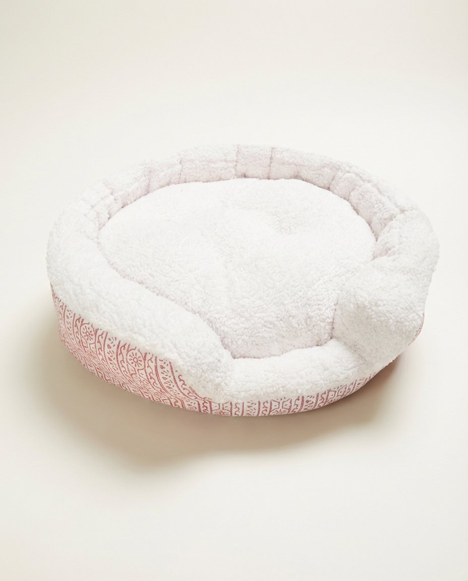 block print dog bed available in multiple sizes with pink canvas exterior