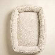 crate mat with premium white sherpa and elastic corner straps